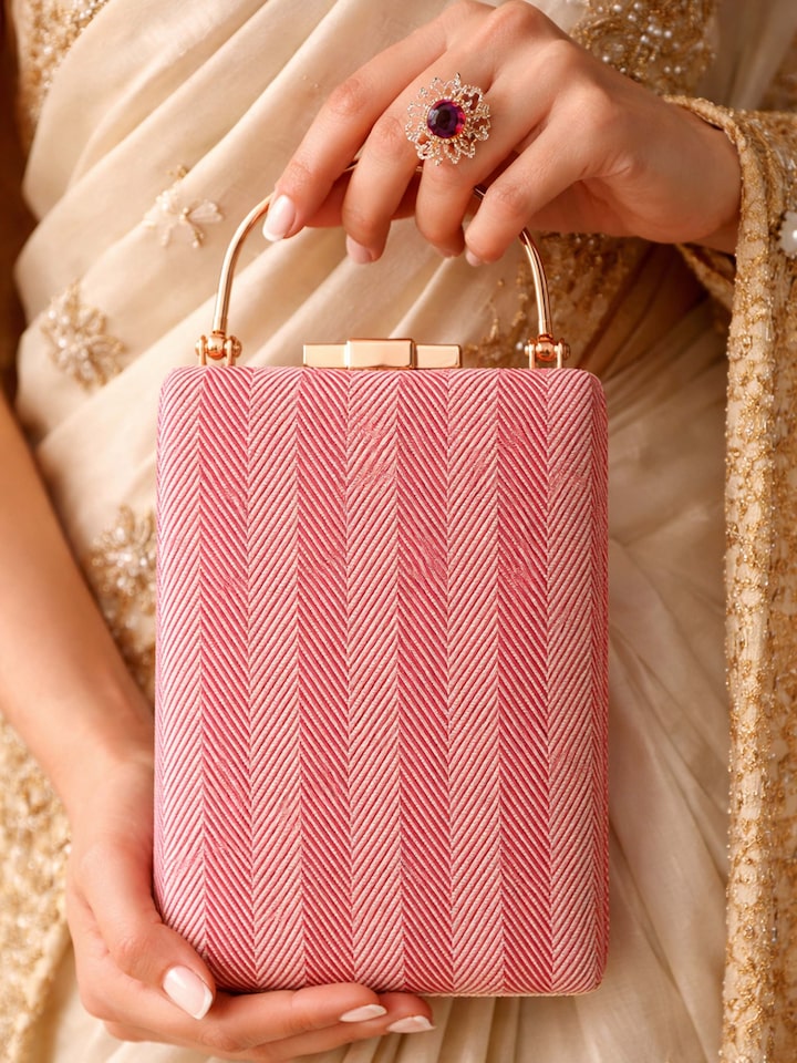 Styled view of Maroon Banarasi Silk Handbag showing the bag styled with an outfit