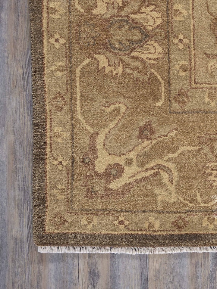 Close-up focusing on the wool fibers and fine knotting technique