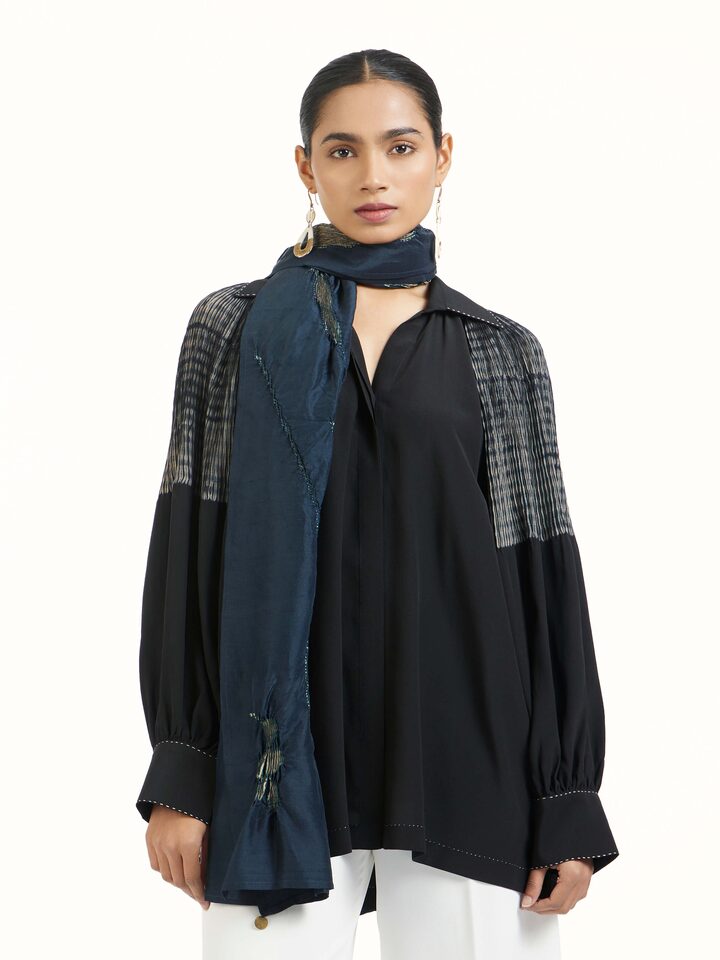 Angled view of Whiskey Blue Tie & Dye Shibori Stole revealing the depth of its color and intricate pattern