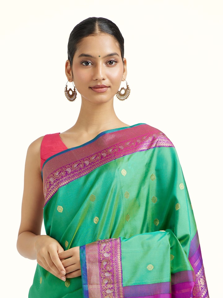 Close-up view of Green Silk Gadwal Saree highlighting the handwoven motif and texture