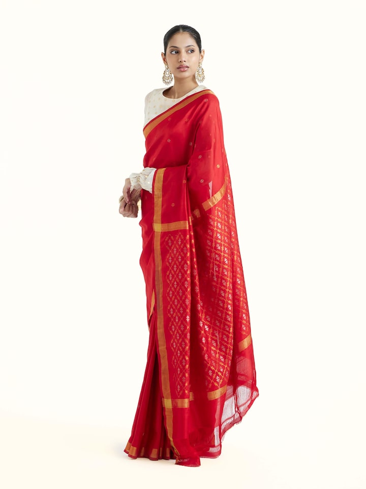 Side view of red mulberry silk Uppada Jamdani saree showcasing fluid drape