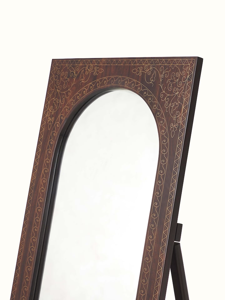 Close-up of the brass detailing on Sheesham Wood & Brass Tarkashi Mirror, focusing on the intricate patterns and design