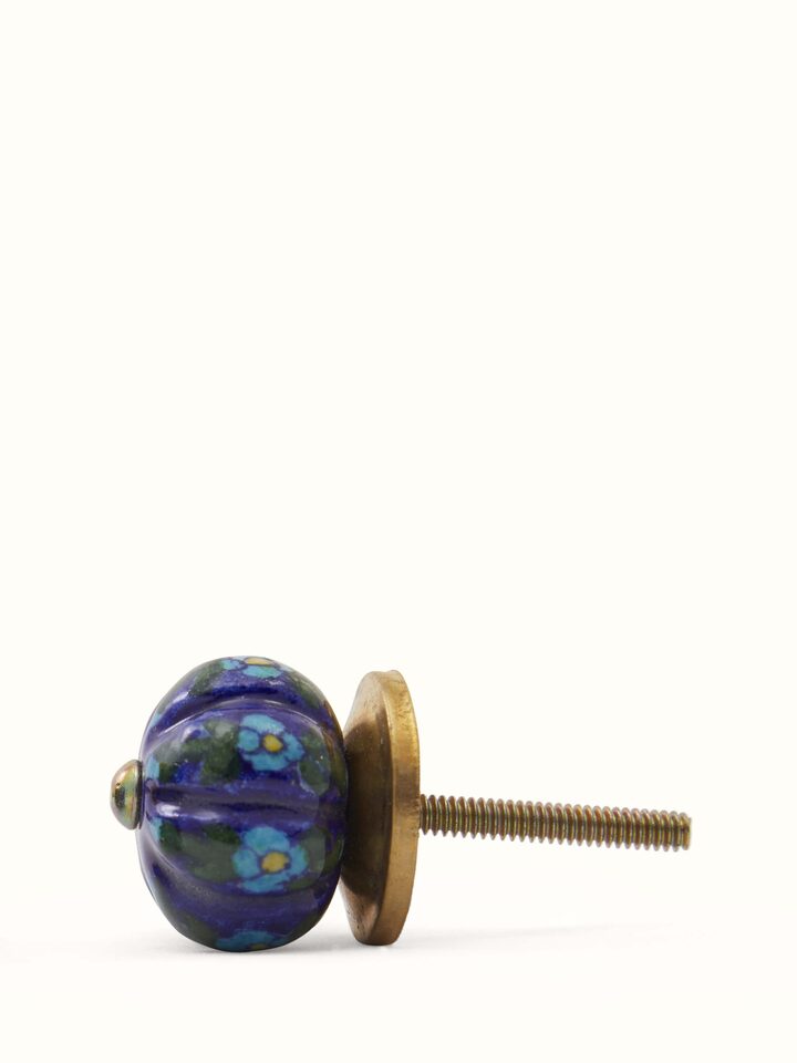 Angled view of Blue Pottery Round Rib Door Knob Set
