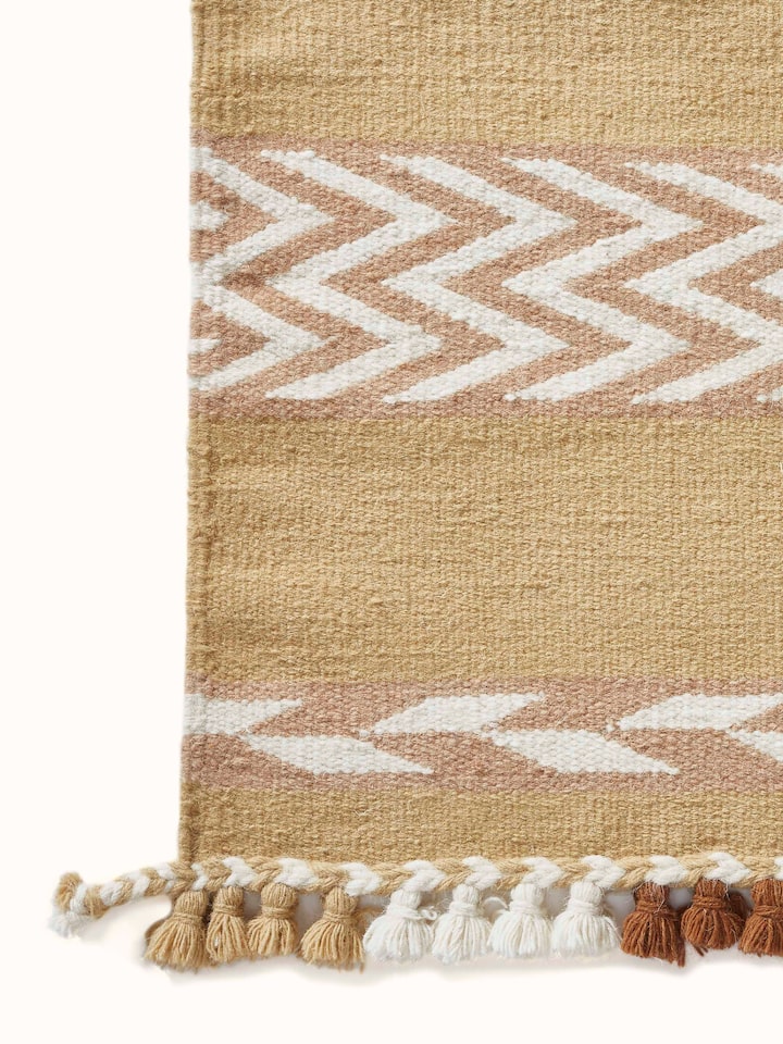 Close-up showing the dense wool fibers and intricate weaving detail