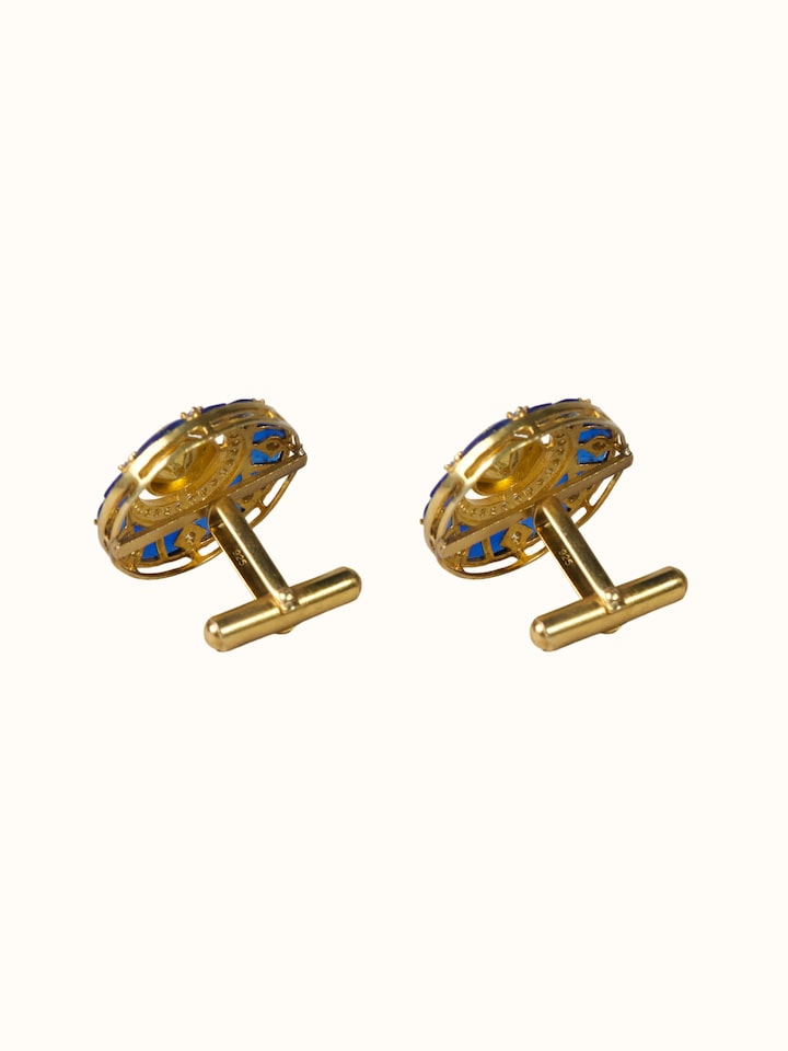 detail view of silver smithing gold plated cufflinks set design