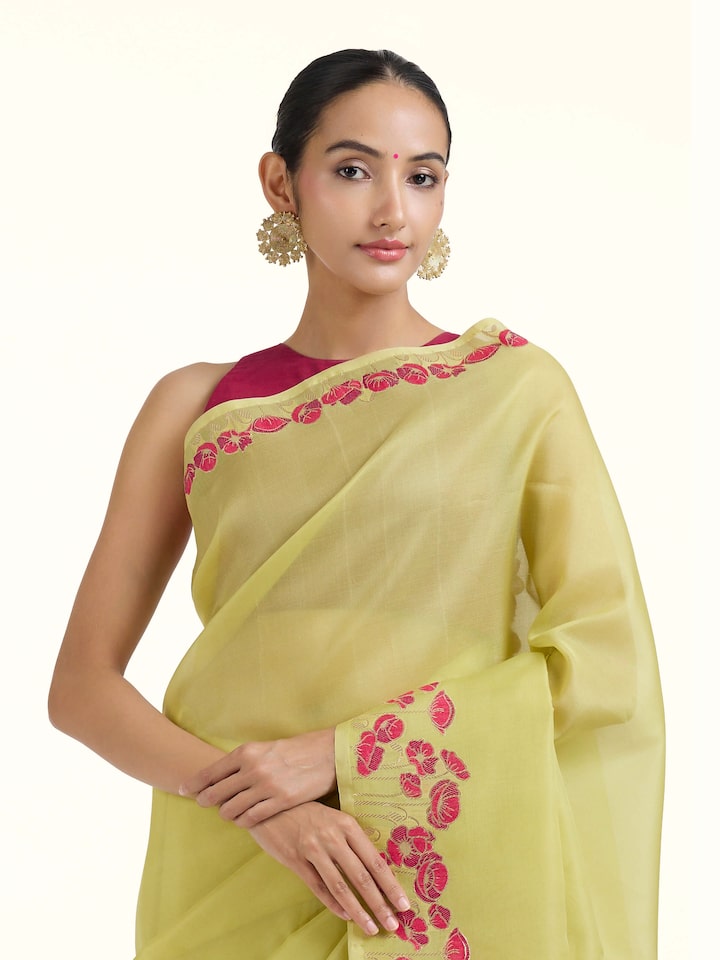 Angled view of the Green Banarasi Organza Silk Saree