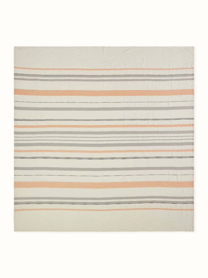 Angled display of Grey Handloom Bedspread, highlighting fine stripe texture and soft finish.