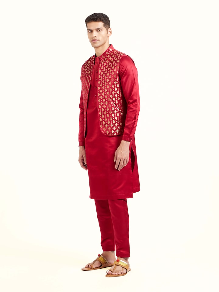 Side view of maroon silk Banarasi sleeveless jacket showcasing tailored fit