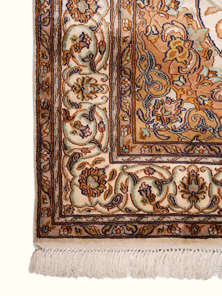 Detail view of Traditional Persian Ivory Rust Kashan Kashmir Silk Hand-Knotted Carpet highlighting the intricate pattern and pile texture