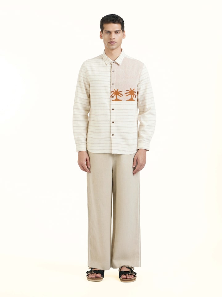 Front view of Ivory Kutchi Embroidered Shirt showcasing its traditional craftsmanship and design