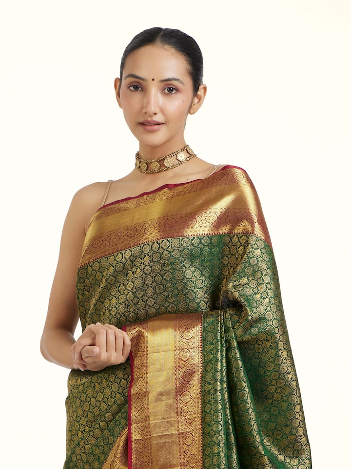 Close-up view of Green Kancheepuram Silk Zari Saree highlighting the handwoven motif and texture
