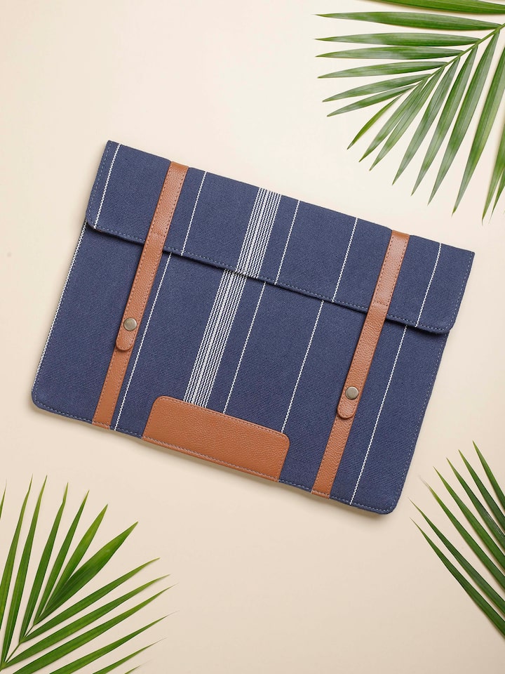 lifestyle view of blue handloom cotton ipad sleeve