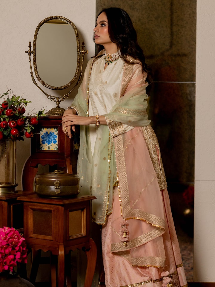 Side view of the Off-white Silk Hand Embroidered Patchwork Kurta Set (2 Pcs)