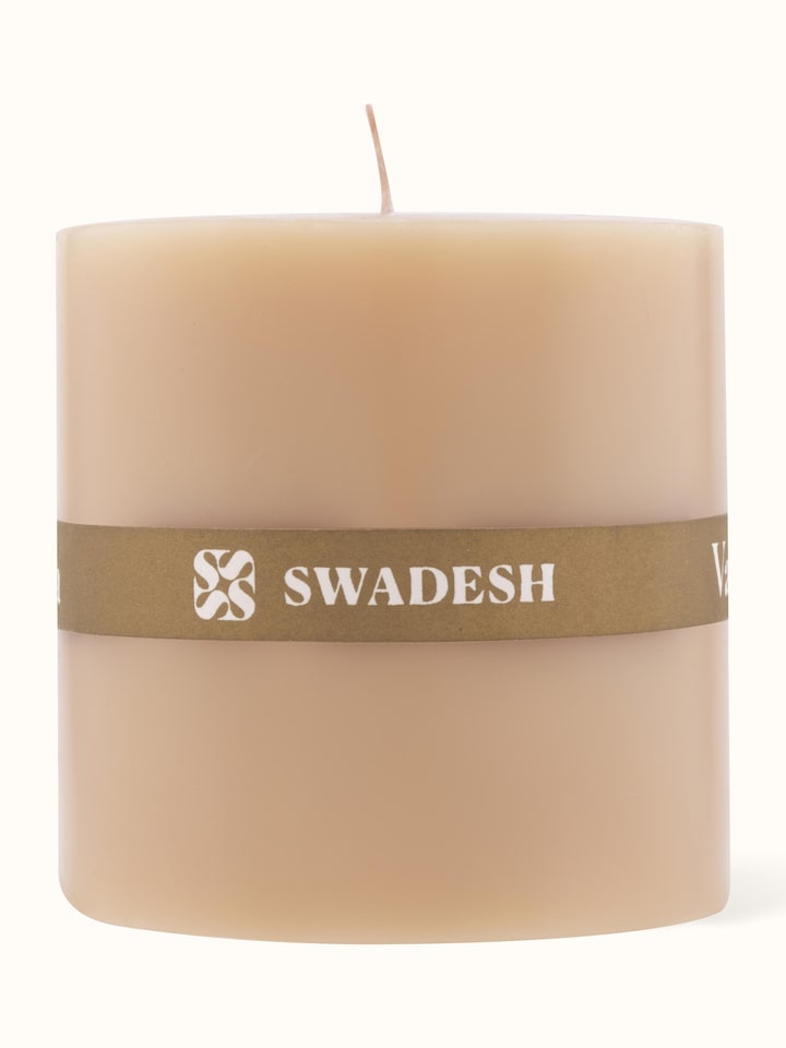 Vanilla pillar candle (3 inches) with a close-up view highlighting its texture and color.