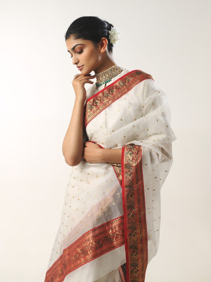 Alternate side view of white cotton silk Chanderi saree emphasizing lightweight texture