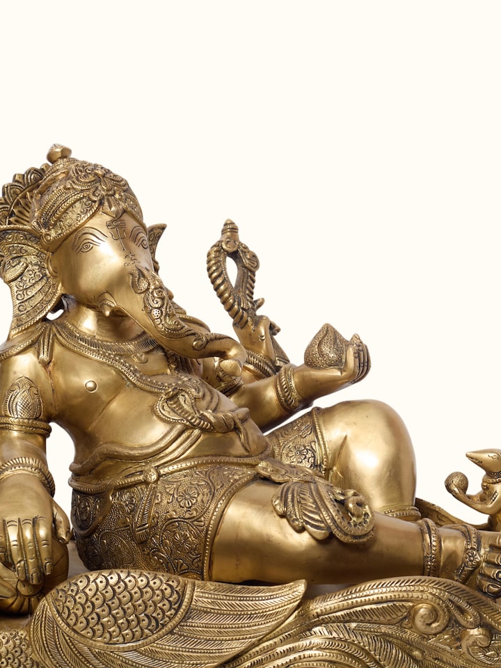 Detailed view of the Brass Ganesha Sitting Peacock Idol