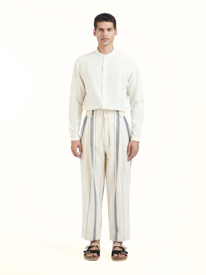Front view of ivory cotton handloom straight pants with clean tailored silhouette