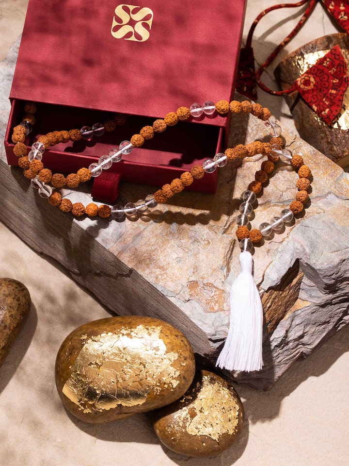 Lifestyle image of Rudraksha & Sphatik Mala styled for spiritual or daily wear aesthetics