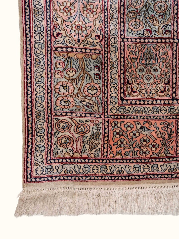 Detail view of Traditional Persian Rust Dabdar Kashmir Silk Hand-Knotted Carpet highlighting the intricate pattern and pile texture, in an alternat...