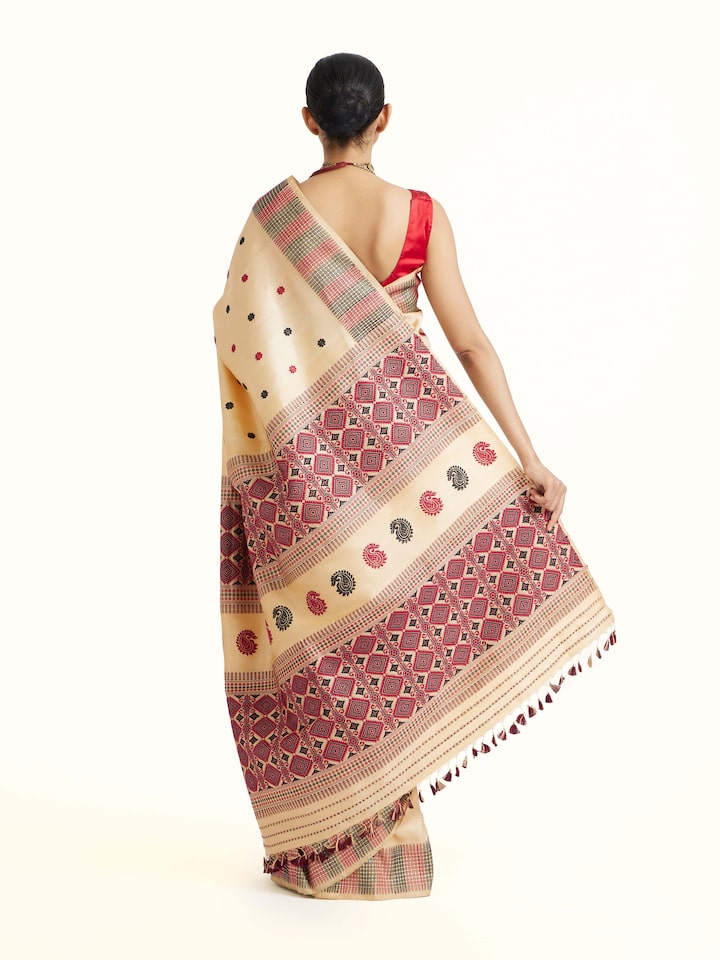 Back view of Beige Tussar Silk Saree showing the pleats and finish