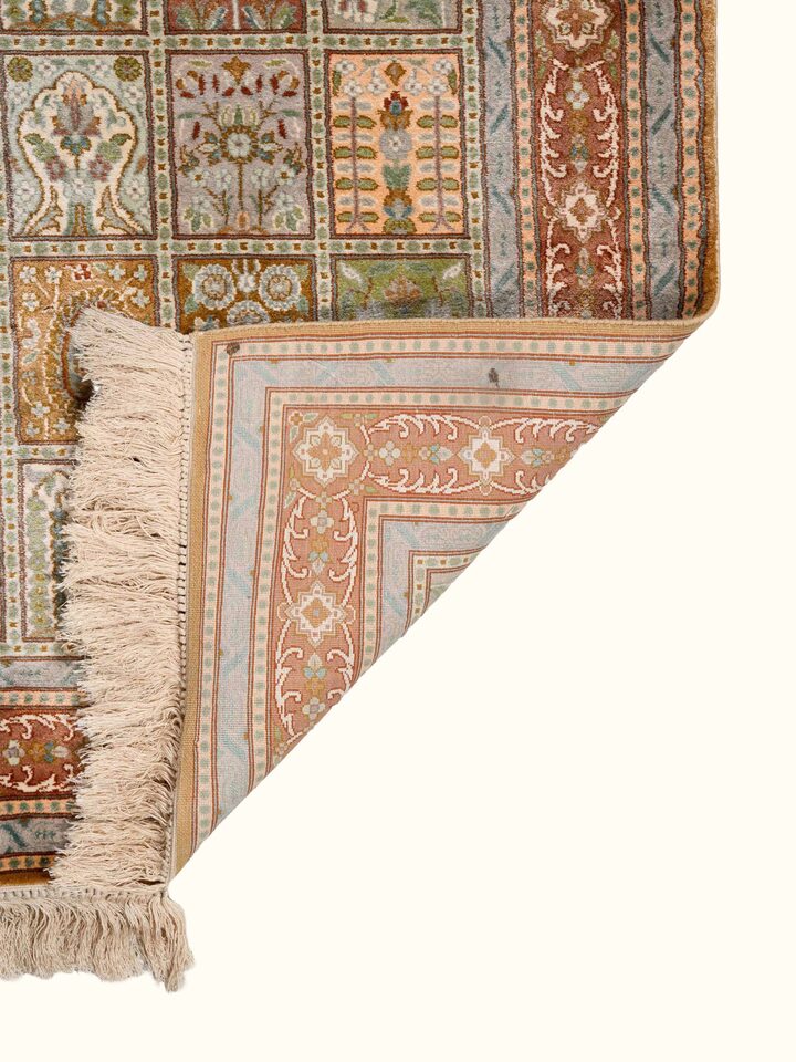 Back view of Traditional Persian Green Dabdar Kashmir Silk Hand-Knotted Carpet showing the reverse weave