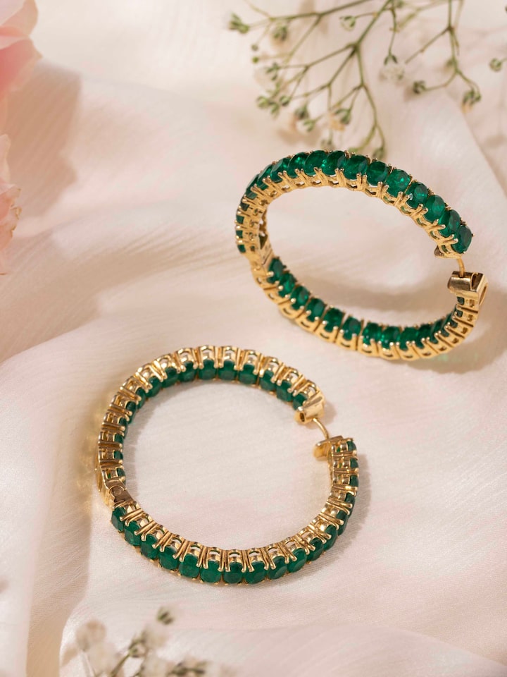 alternate lifestyle view of silver smithing silver hoop earrings