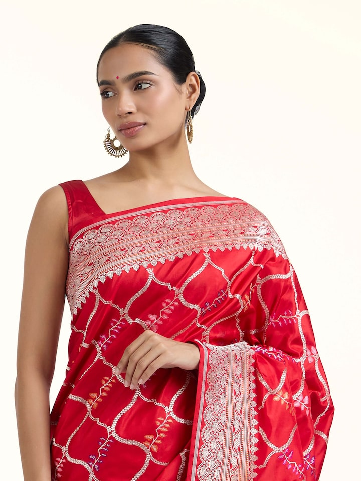 Angled view of Pink Banarasi Kadhwa Silk Saree revealing the depth of its color and intricate pattern