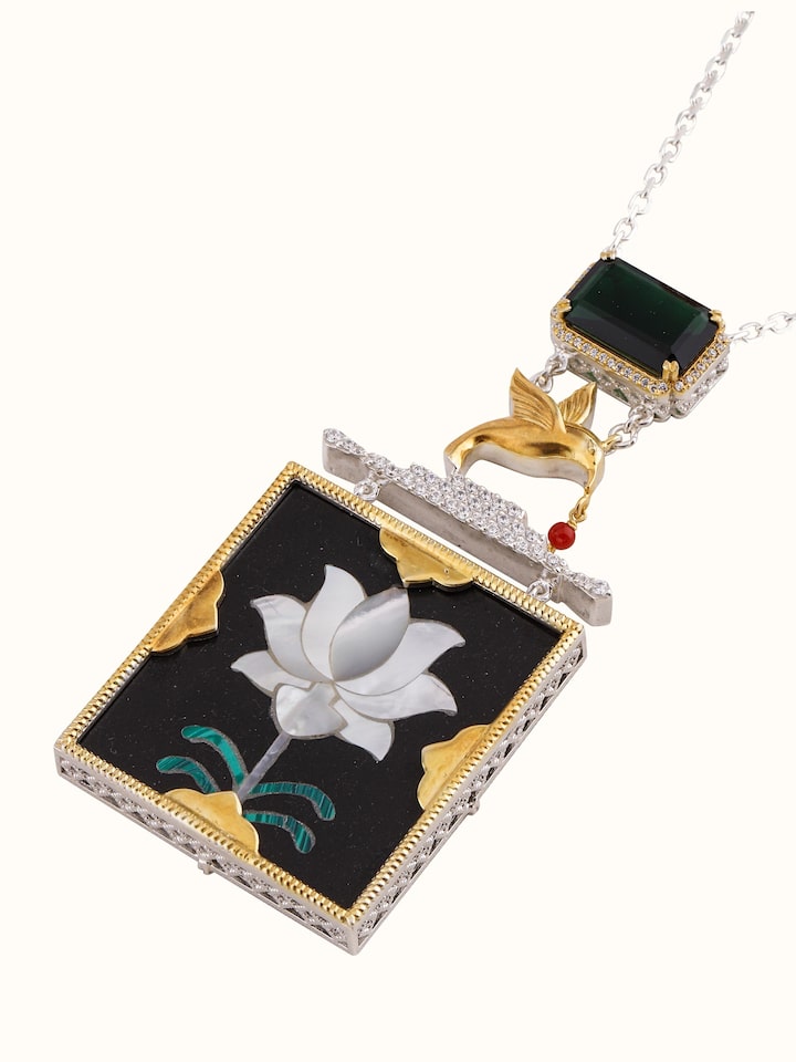 Overhead view focusing on the pendant’s unique design and silver finish