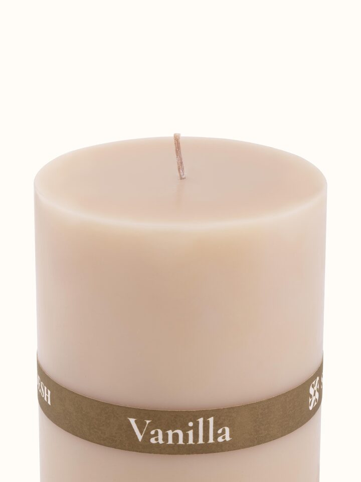 Detail shot of Vanilla Pillar Candle (4.5 inches) highlighting wax texture and smooth finish