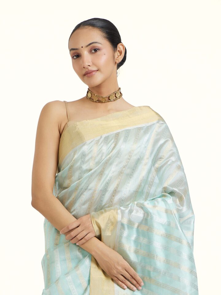 Angled view of Light Blue Chanderi Jal Saree revealing the depth of its color and intricate pattern