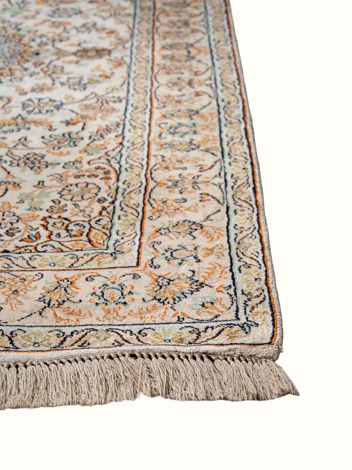 Close-up view of Traditional Persian Beige Kashan Kashmir Silk Hand-Knotted Carpet highlighting the hand-knotted weave and motif detail