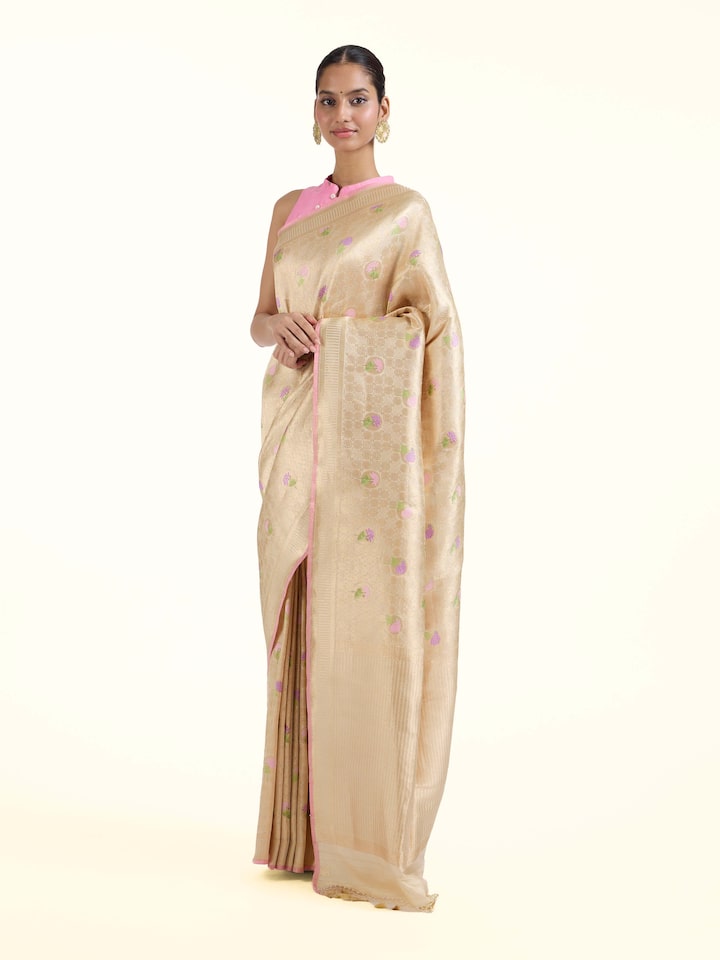 Side view of Off-white Banarasi Brocade Silk Saree highlighting the detailed craftsmanship and elegant silhouette