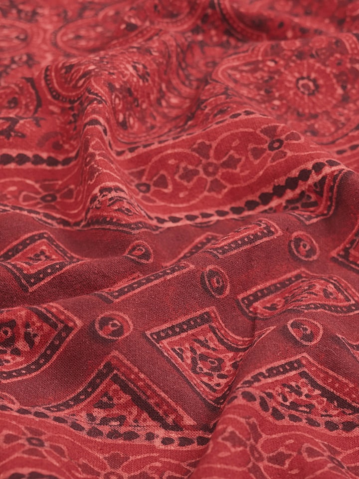 Sindh maroon jaal cotton ajrakh block printed king bedspread set (3 pcs) displayed on a bed to show the full set and design.