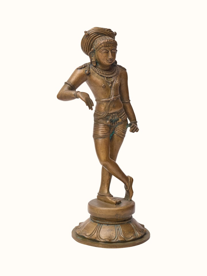 Angled view of the Bronze Cast Rishabha Deva Idol
