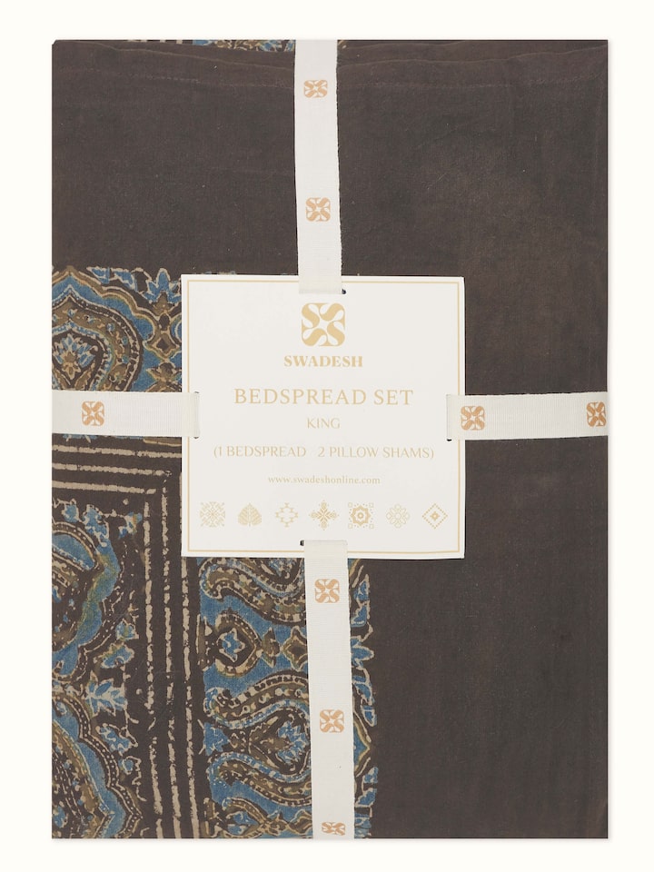 Close-up view of Sindh dark brown jaal cotton Ajrakh block printed king bedspread set (3 pcs) highlighting the Ajrakh print and cotton texture.