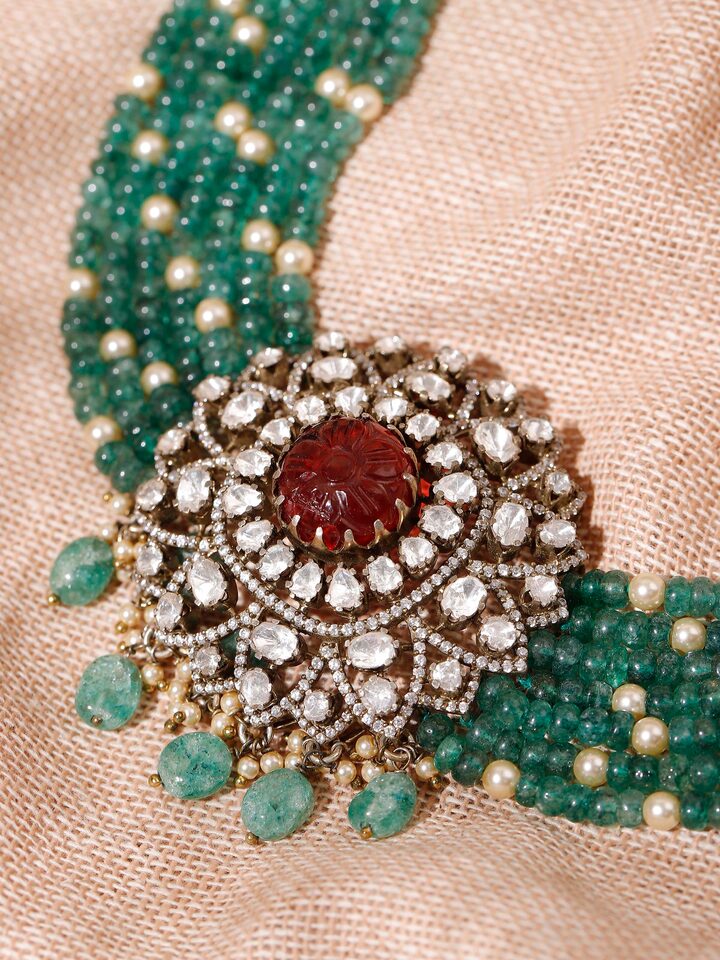 Close-up of Polki work on silver choker necklace