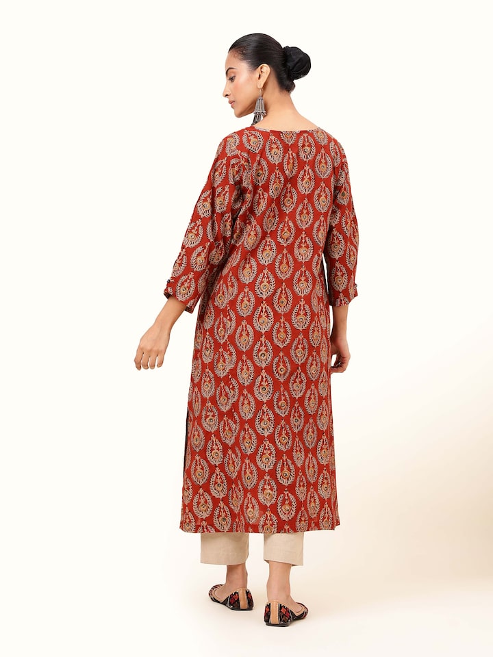 Back view capturing the design continuity and traditional charm.
