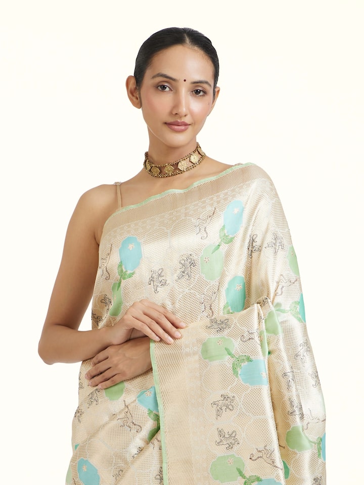 Back view of the Off-white Silk Brocade Handloom Banarasi Saree
