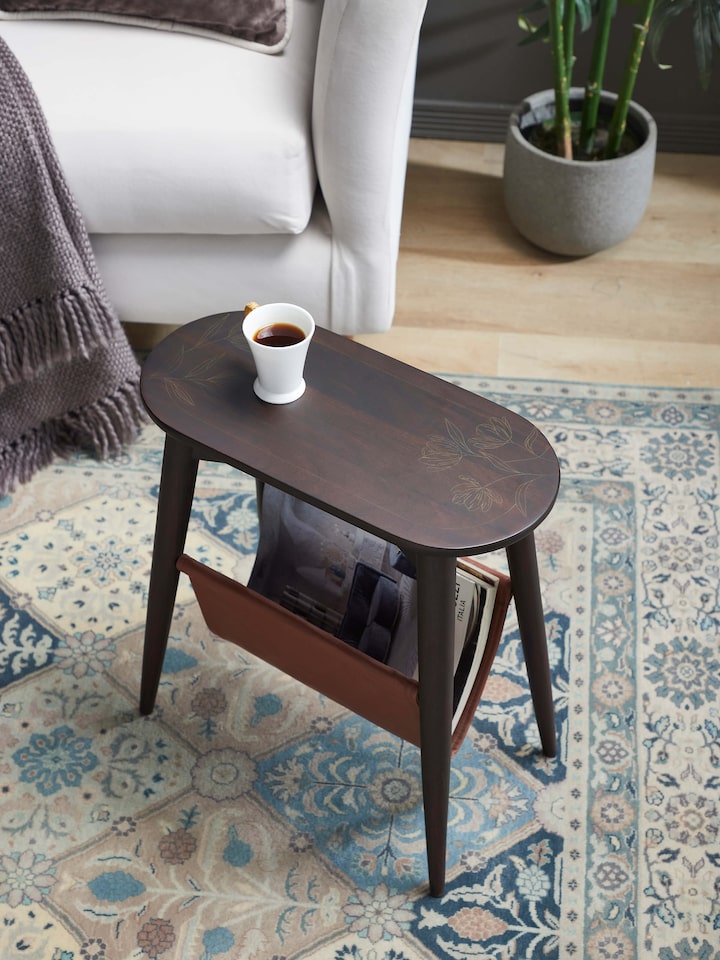 Lifestyle view of the Sheesham Wood & Brass Tarkashi Magazine Rack
