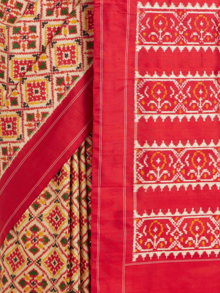 Detailed view of Cream Pochampally Double Ikat Silk Saree focusing on the fine craftsmanship and texture