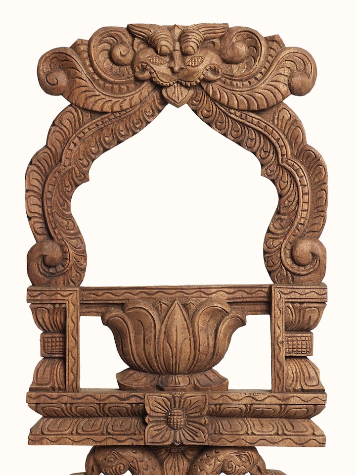 Detail view of the Wood Carved Parrot Mirror Panel