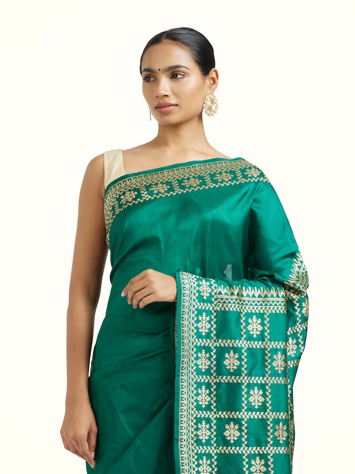 Angled view of the Green Mulberry Katan Silk Banarasi Saree