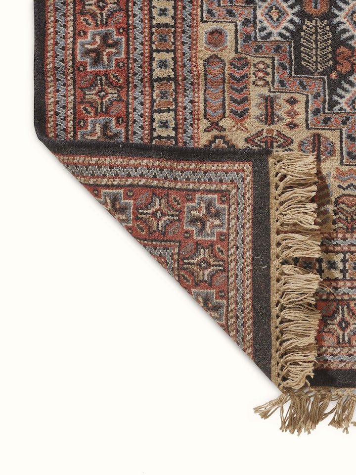 Persian Shiraz Gwalior Wool Hand-Knotted Rug in a room setting, highlighting its integration into home decor.