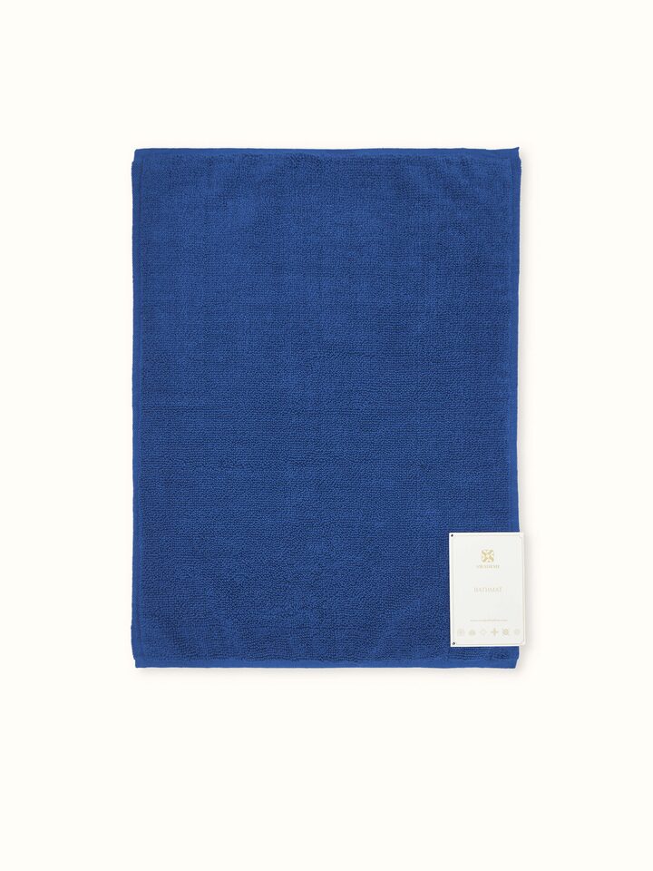 Back side view of Nityam blue cotton bath mat