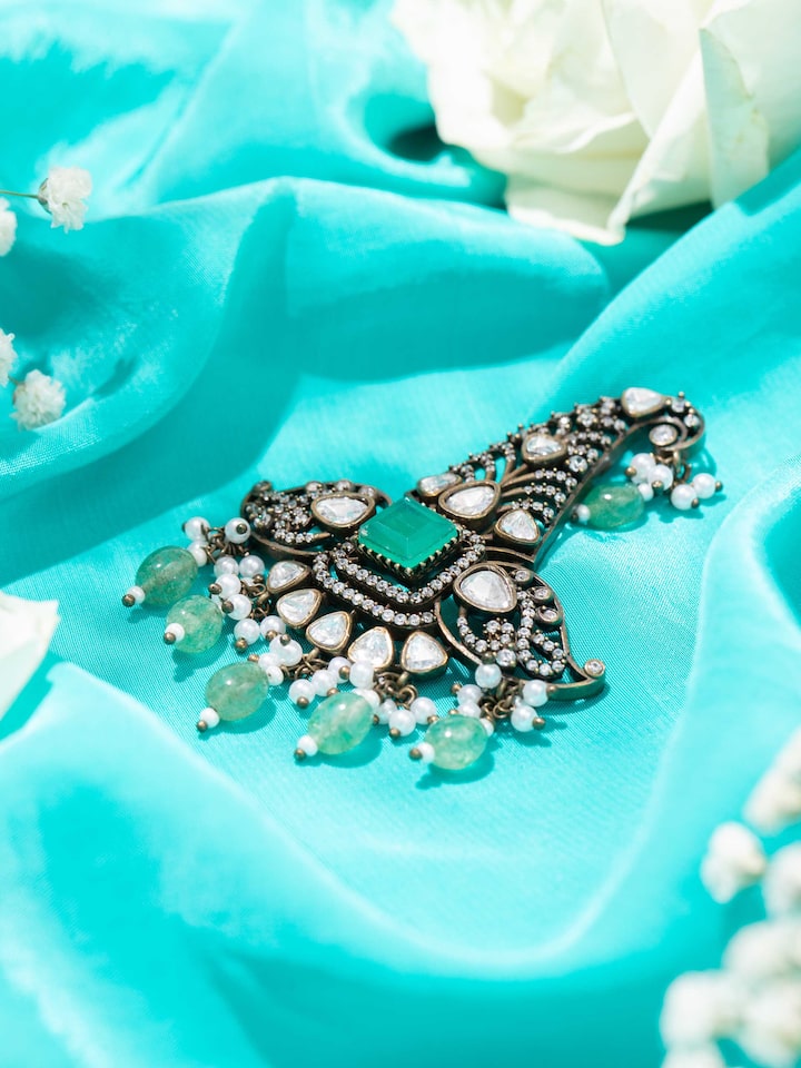 Styled detail view of Silver Smithing Brooch Pin pinned onto fabric, shown in another styled shot