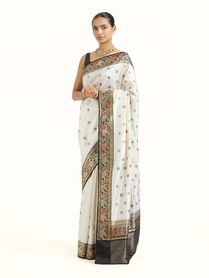Side view of Off-white Banarasi Kadhwa Silk Saree highlighting the detailed craftsmanship and elegant silhouette