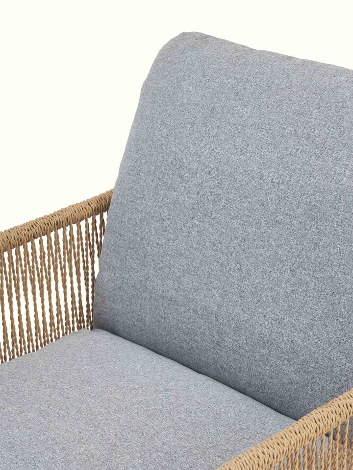 Detailed view of Upholstered Metal Paper Cord Weave Armchair focusing on the intricate weave and comfortable upholstery.