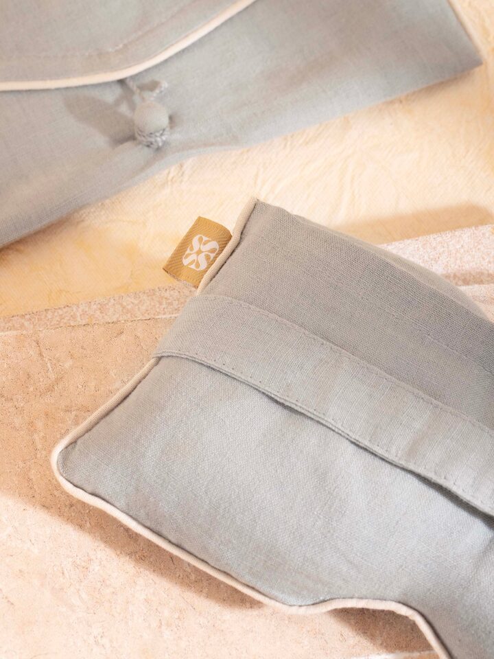 Styled detail view of Flaxseed and Lavender Eye Pillow Light Green shown in another styled setting