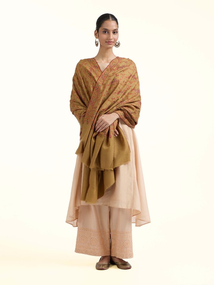 Front view of green jalidar sozni embroidered shawl with all-over embroidery