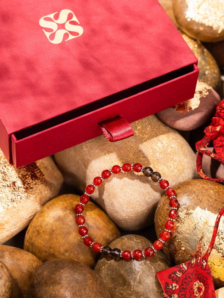Styled detail view of Carnelian & Smoky Topaz Silver Bracelet shown in an alternate styled shot